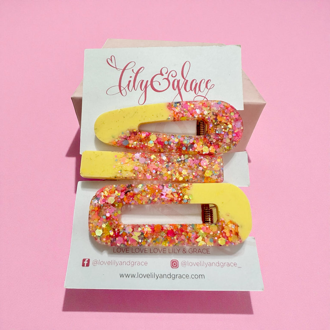 GLITTER FILLED RESIN HAIR GRIPS 001